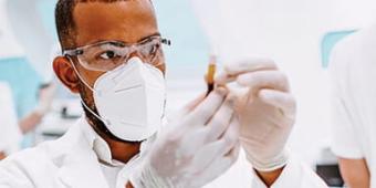 Researcher with test tube
