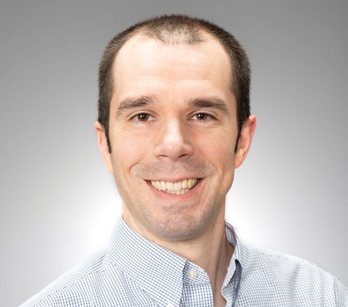 Headshot of Travis McCaw